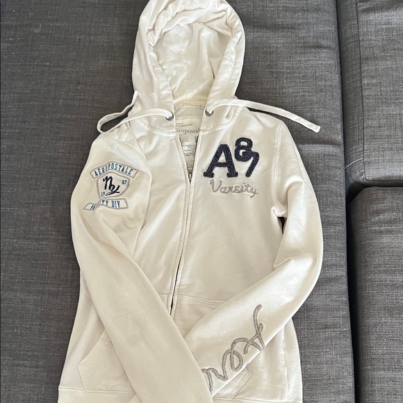 Aeropostale Tops - Aeropostale Cream Hoodie with Navy Patch Details